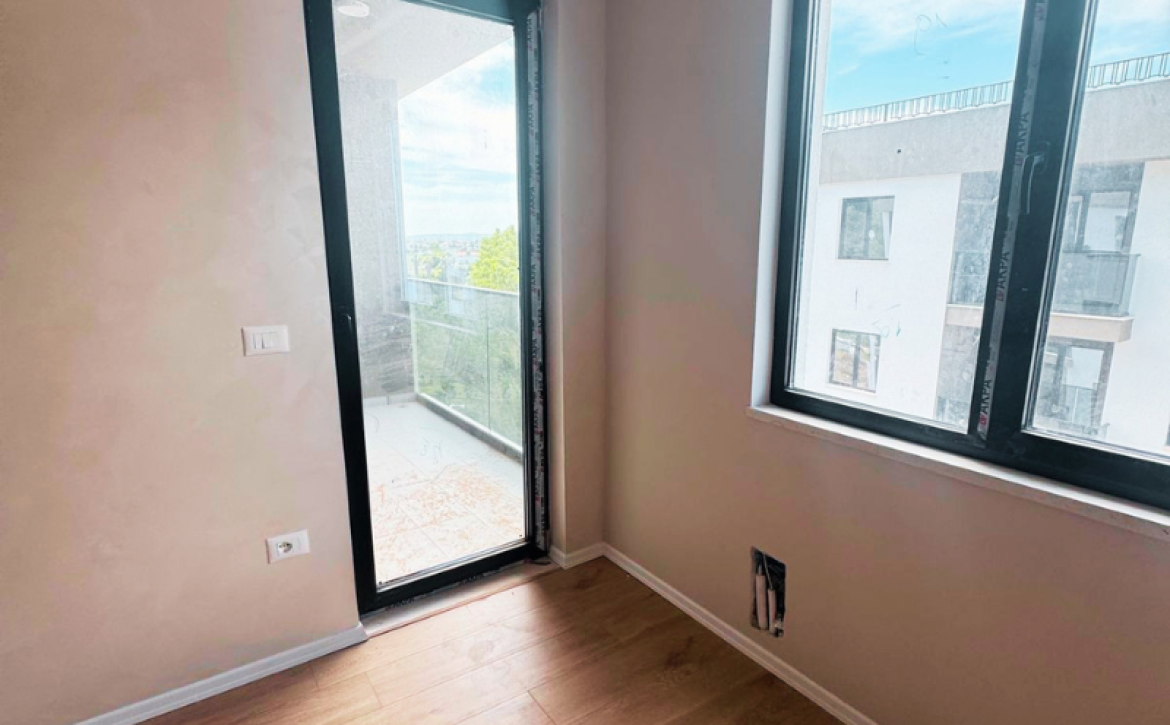 Modern apartment in new residential building, 5th floor, shared swimming pool in courtyard, Albania development, under construction