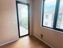 Modern apartment in new residential building, 5th floor, shared swimming pool in courtyard, Albania development, under construction