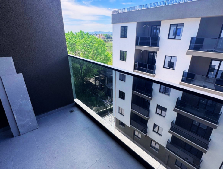 Modern apartment in new residential building, 5th floor, shared swimming pool in courtyard, Albania development, under construction