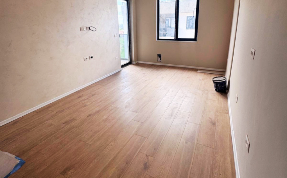 Modern apartment in new residential building, 5th floor, shared swimming pool in courtyard, Albania development, under construction