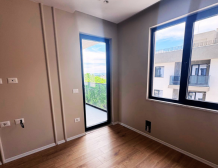 Modern apartment in new residential building, 5th floor, shared swimming pool in courtyard, Albania development, under construction