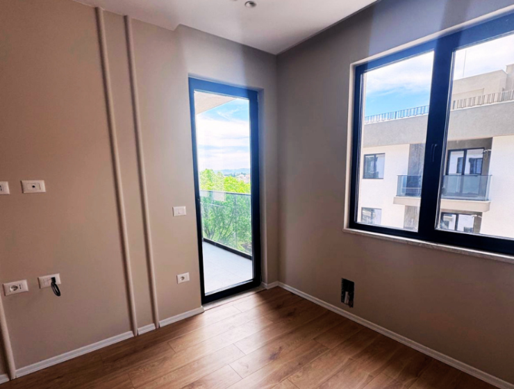 Modern apartment in new residential building, 5th floor, shared swimming pool in courtyard, Albania development, under construction