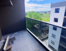 Modern apartment in new residential building, 5th floor, shared swimming pool in courtyard, Albania development, under construction