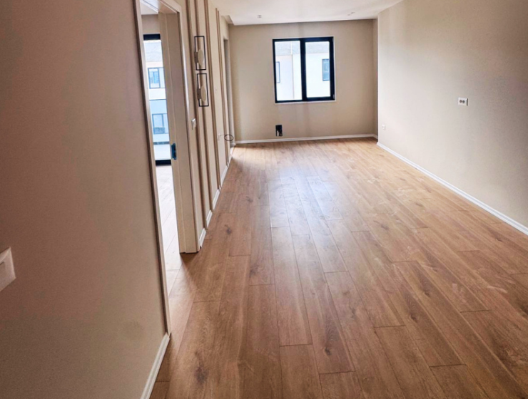 Modern apartment in new residential building, 5th floor, shared swimming pool in courtyard, Albania development, under construction