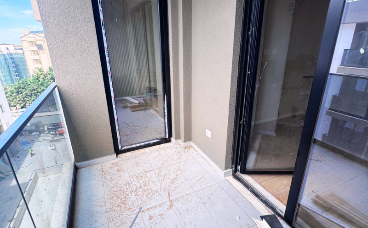 Modern apartment in new residential building, 5th floor, shared swimming pool in courtyard, Albania development, under construction