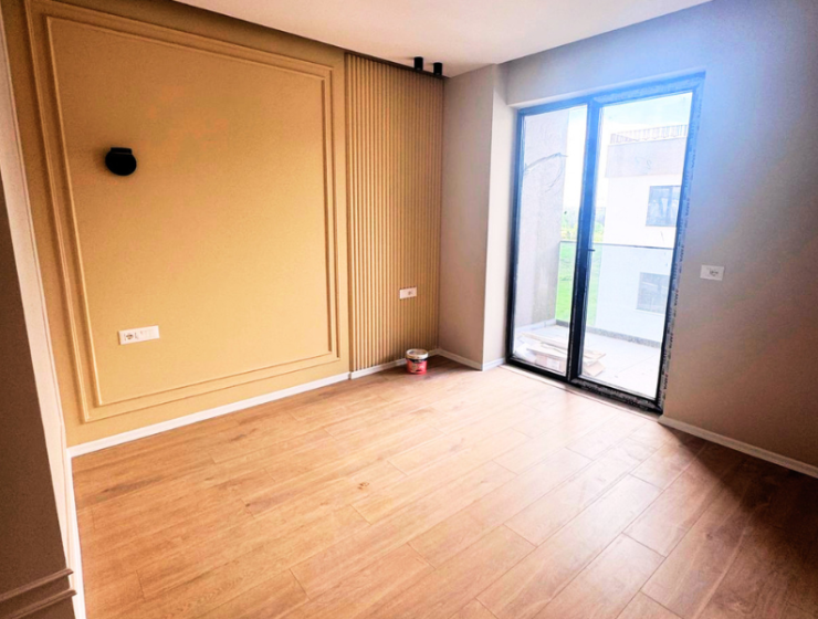 Modern apartment in new residential building, 5th floor, shared swimming pool in courtyard, Albania development, under construction